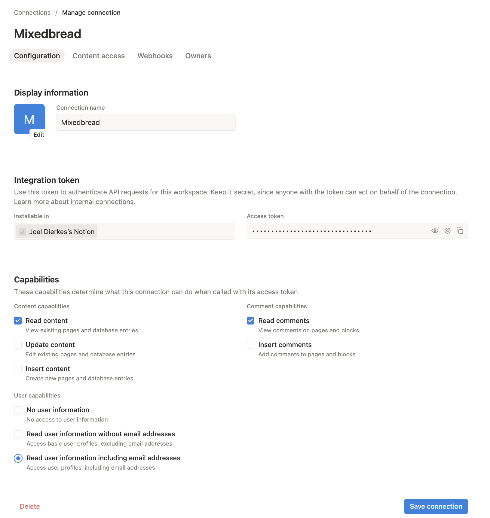 Notion connection Configuration tab showing the access token and capabilities